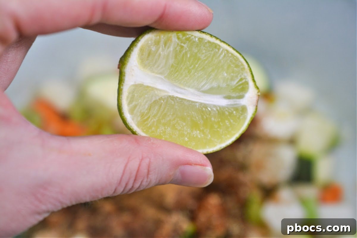 Mixing garlic into the spiced vegetables