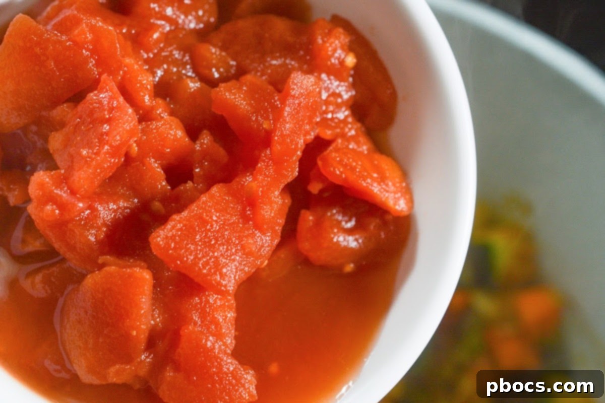 Squeezing fresh lime juice into the pot
