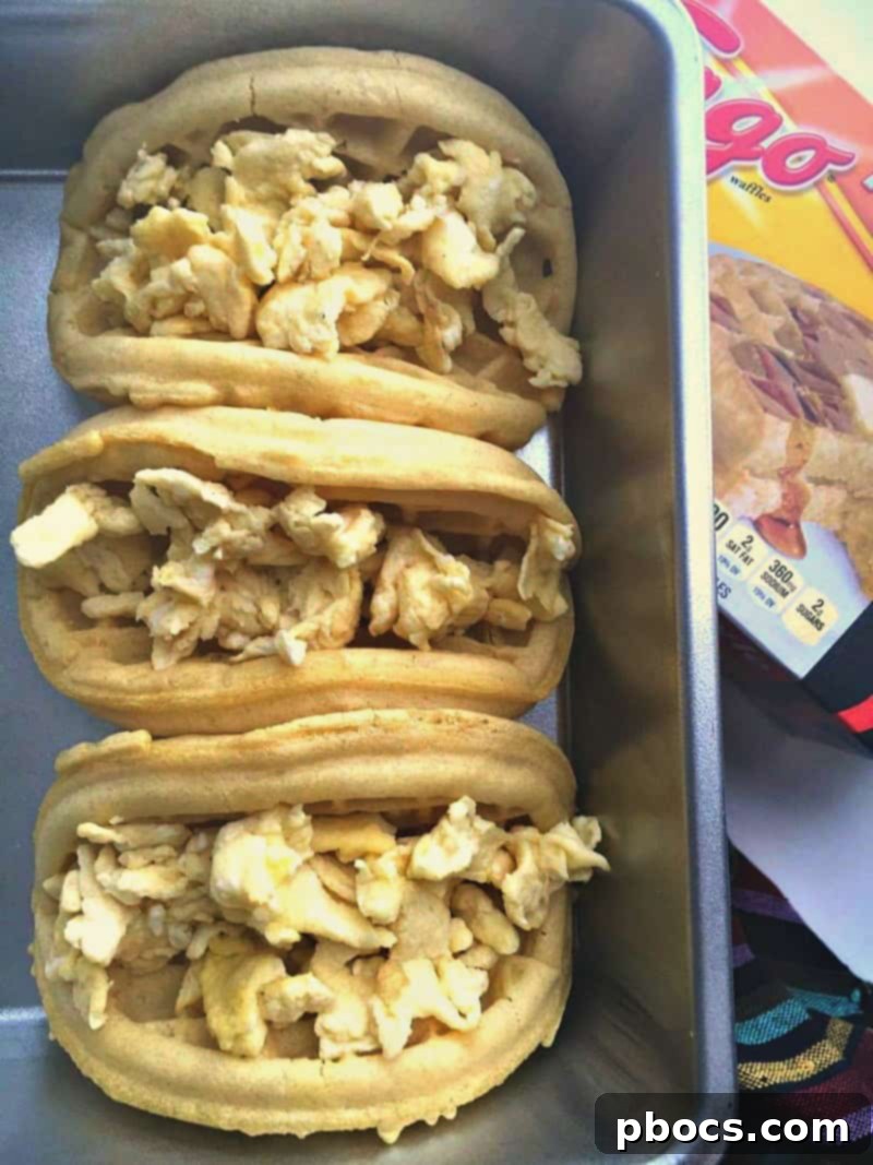 Filling Eggo Waffles with scrambled eggs to create breakfast tacos