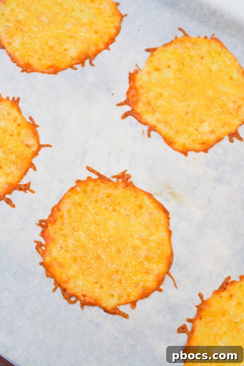 Baking cheese circles until golden brown for keto wraps