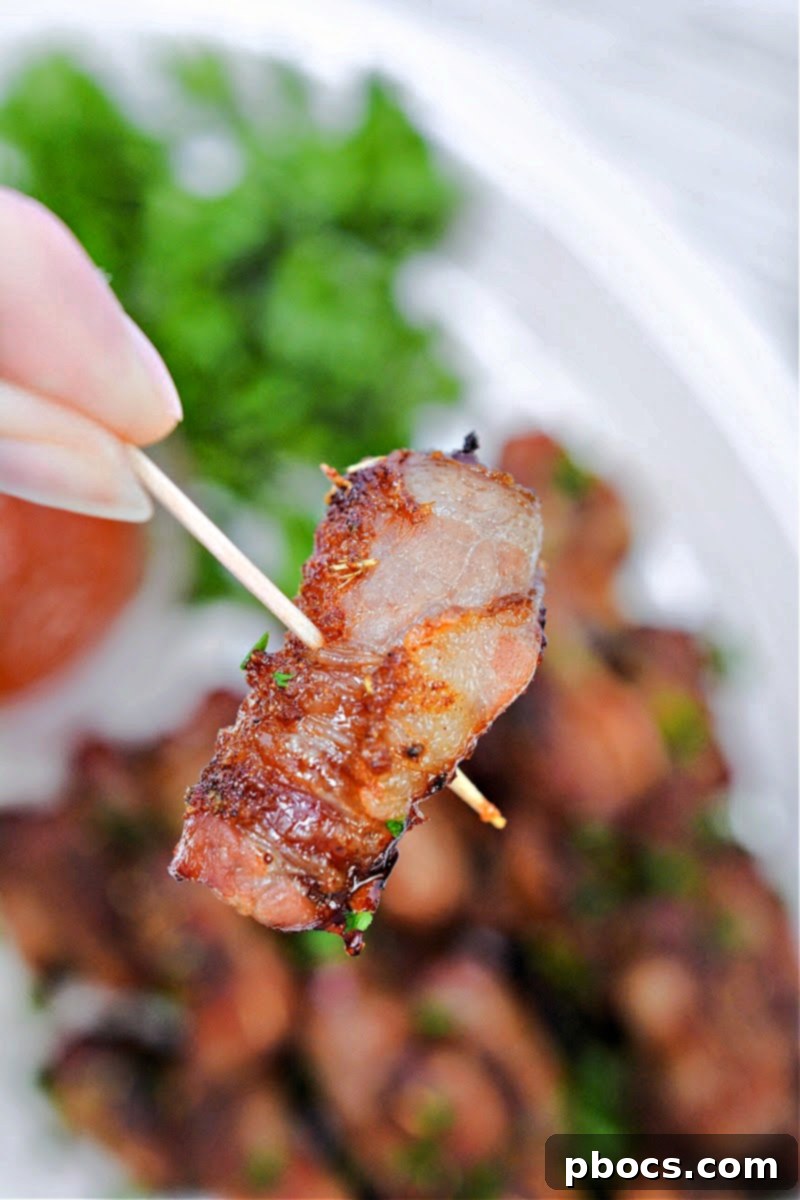 Close-up of Keto Sweet and Spicy Bacon Wrapped Little Smokies ready to be served