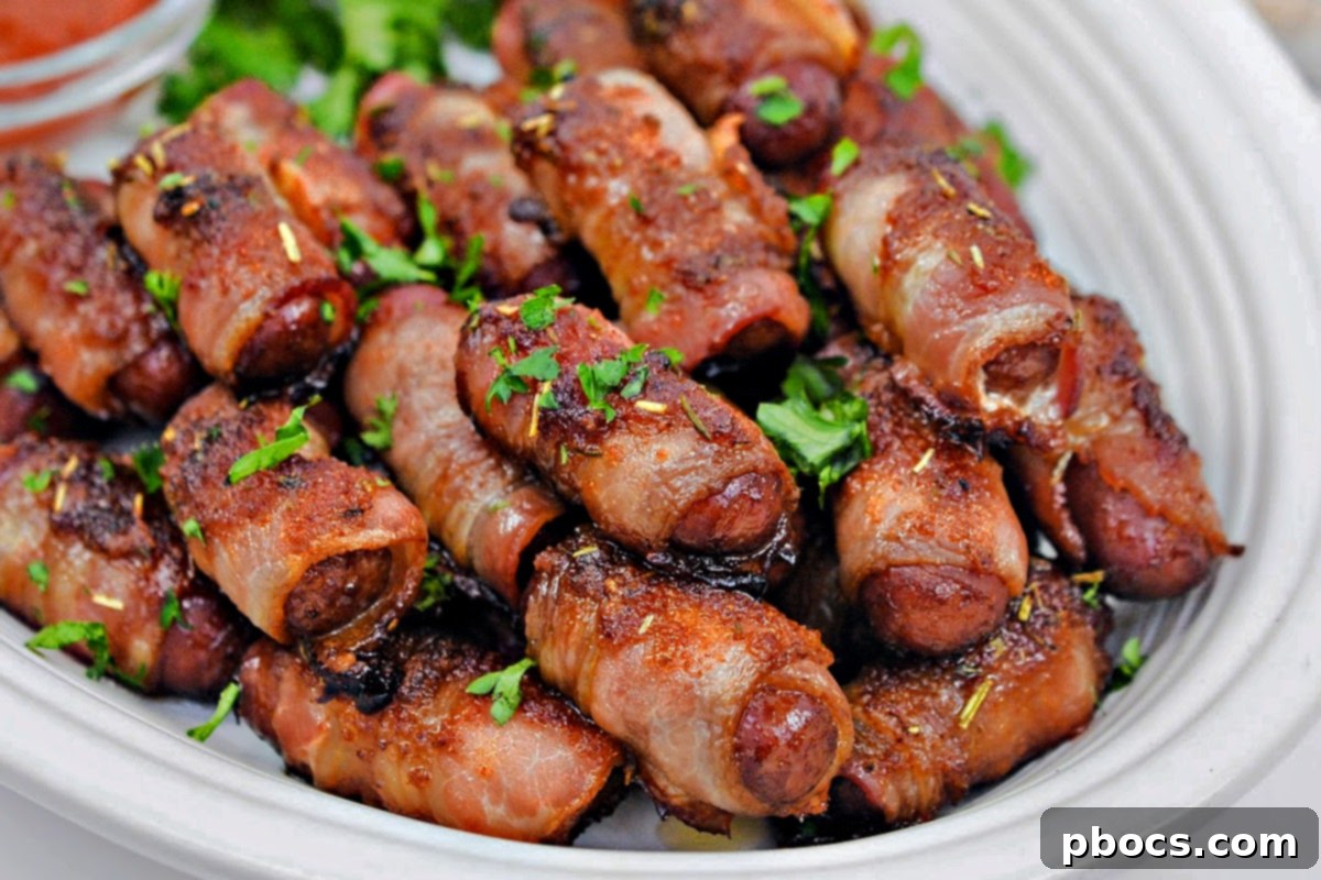 Cooked Keto Sweet and Spicy Bacon Wrapped Little Smokies garnished with parsley