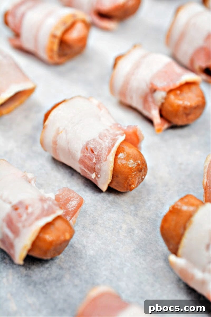 Bacon being cut into thirds on a cutting board