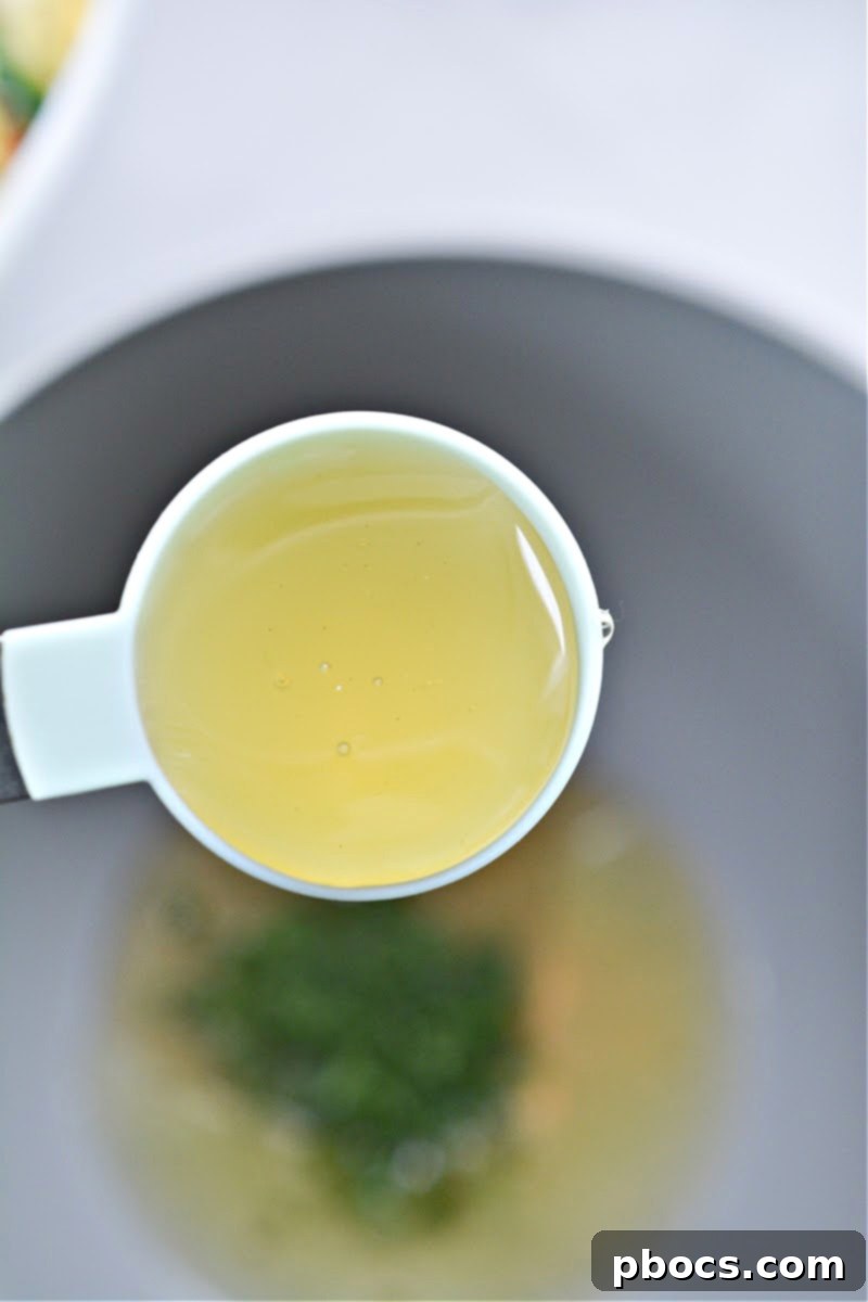 Whisking sweet dill dressing for the Keto TikTok Hot Girl Summer Chicken Salad