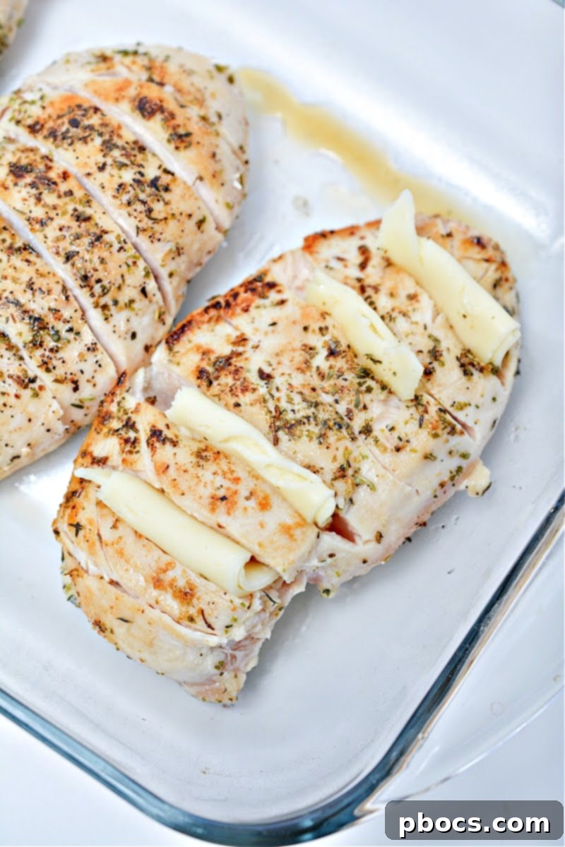 Antipasto-Loaded Keto Hasselback Chicken 12 Making Hasselback slices on chicken breast