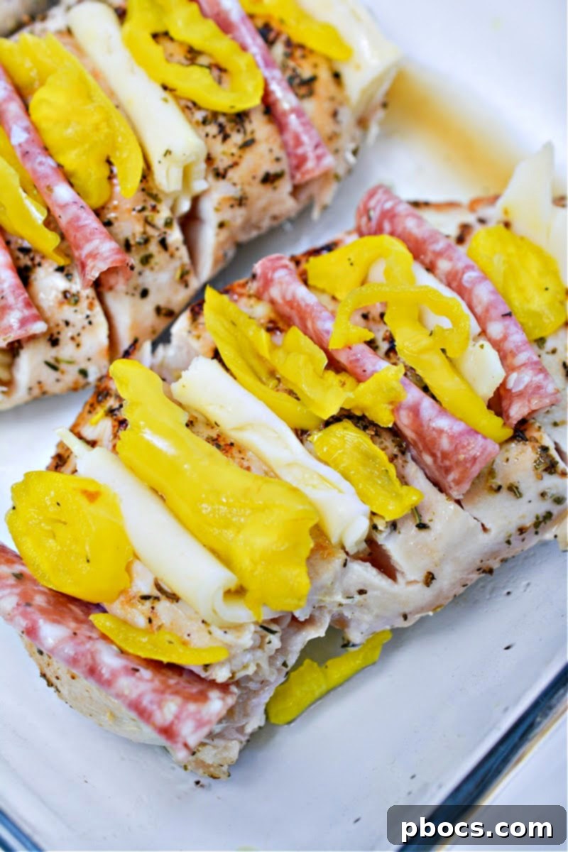 Antipasto-Loaded Keto Hasselback Chicken 13 Stuffing chicken with provolone, mozzarella, and salami