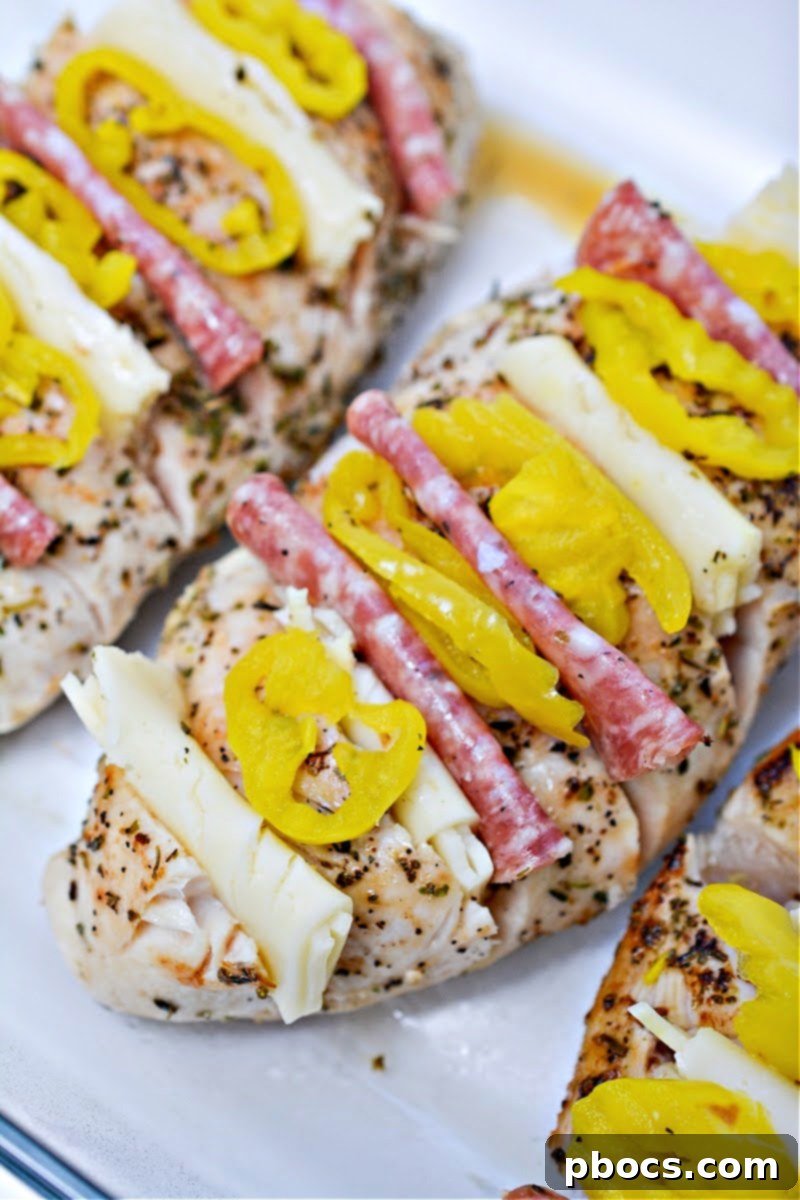 Antipasto-Loaded Keto Hasselback Chicken 5 Close up of Hasselback slices on chicken breast