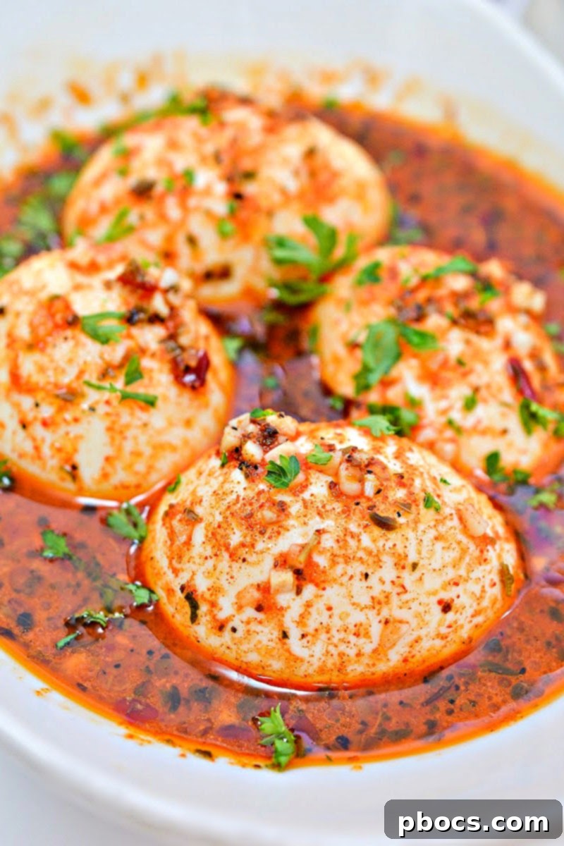 Keto TikTok Egg Boil with rich, spicy sauce
