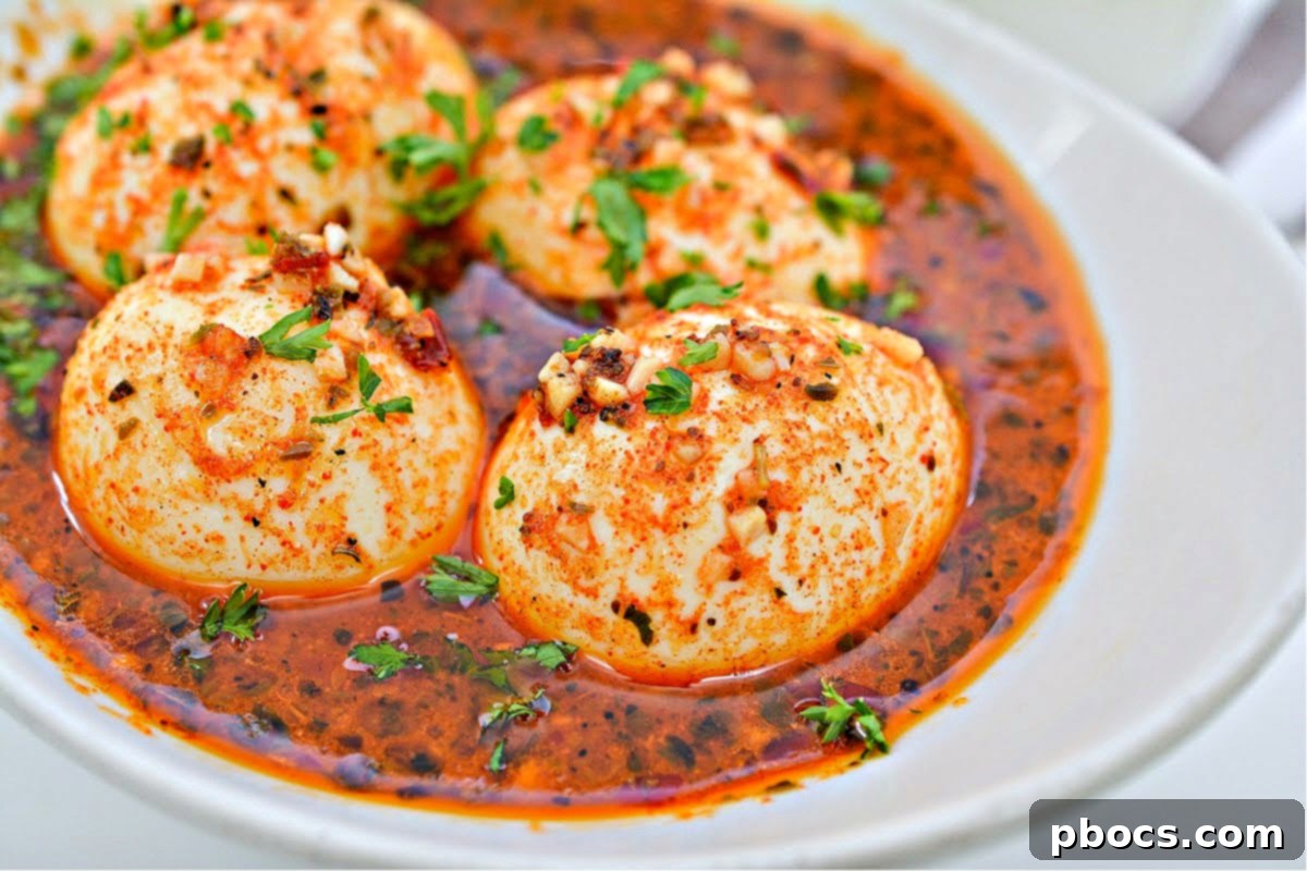 Keto friendly spicy boiled eggs in a dish