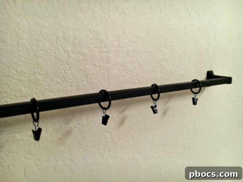 Securing the towel bar to the wall