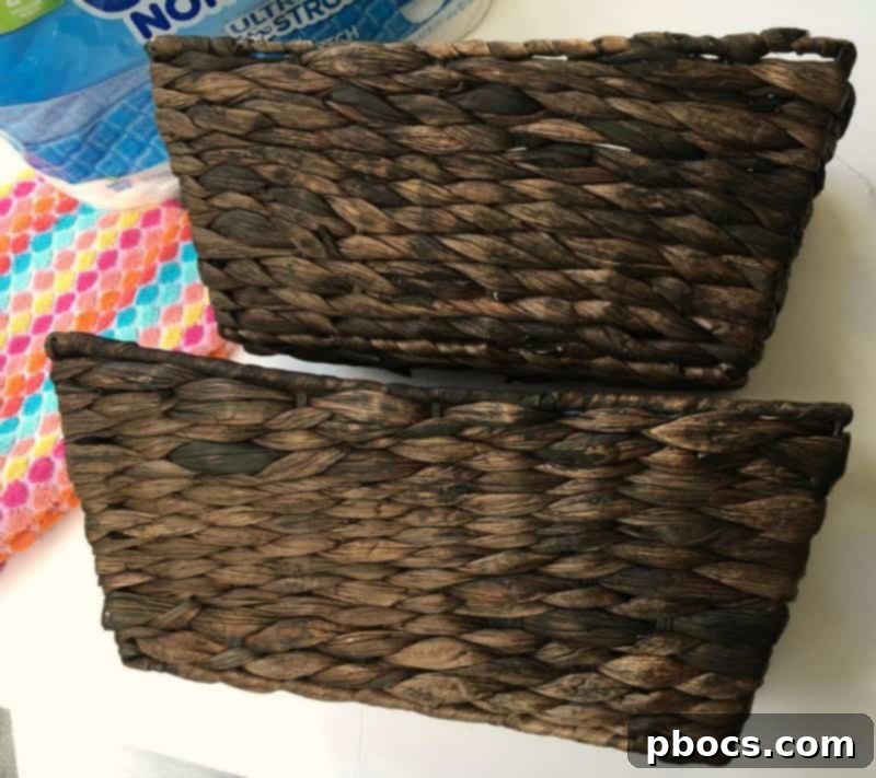 Wicker basket being clipped onto the towel bar