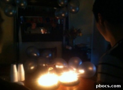 Elegant 18th birthday party setup with black, white, and silver theme