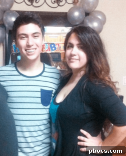 Proud parent with 18-year-old son Evan at his birthday celebration