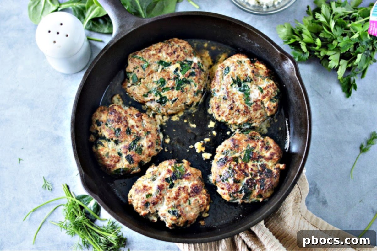 Keto Spinach Feta Turkey Burgers baking in the oven