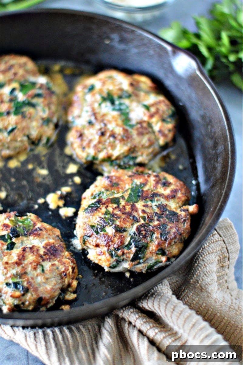 Uncooked Keto Spinach Feta Turkey Burger patties ready for cooking