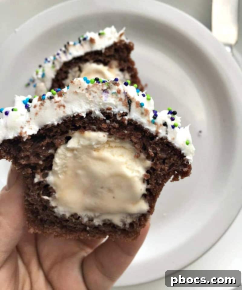A large platter filled with a variety of colorful and decorated Ice Cream Filled Cupcakes, perfect for sharing