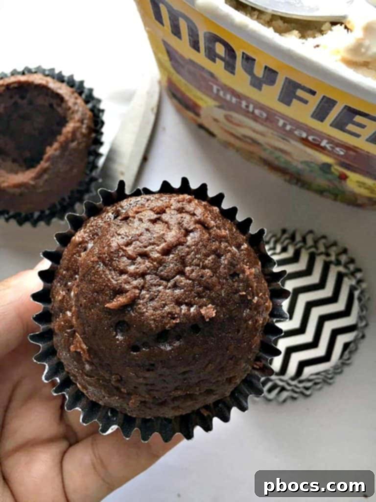 The cupcake tops placed back onto the ice cream-filled cupcakes, ready for chilling
