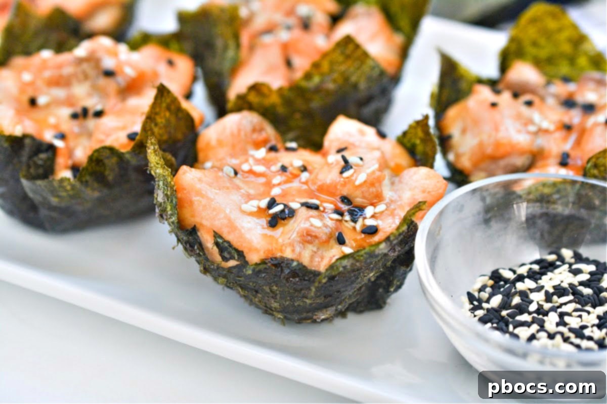 A platter brimming with freshly baked Keto TikTok Salmon Sushi Nori Cups, ready to be served