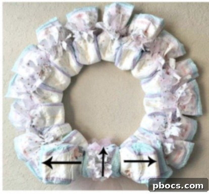 Step-by-Step Visual for Creating a Diaper Bow on a Wreath