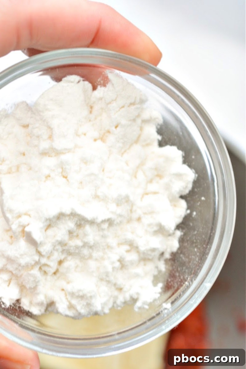 Strawberry Shortcake Chaffle Dippers with Keto Cream Dream 11 Cream Cheese in a small bowl