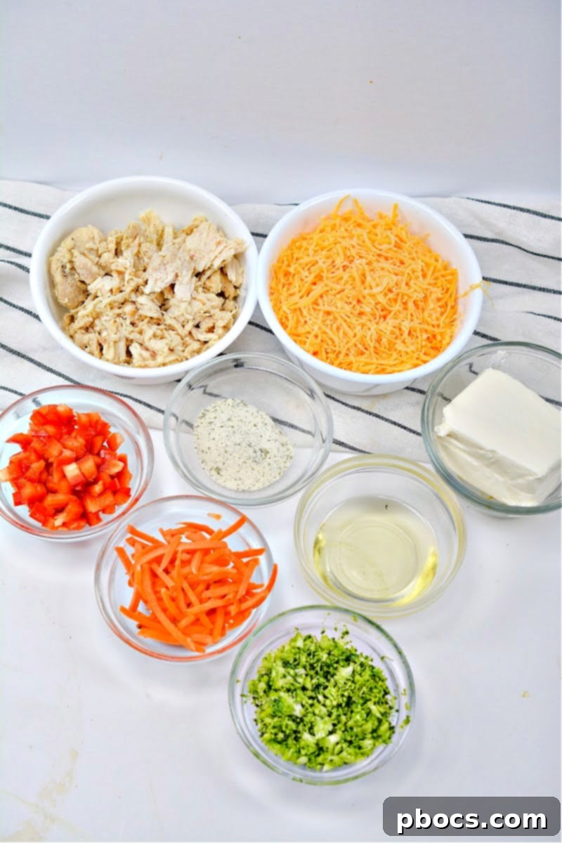All the fresh ingredients laid out on a table, ready to make Keto Ranch Cream Cheese Chicken and Veggies Roll Ups.