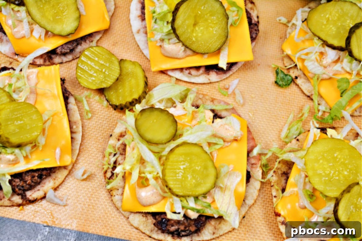 Keto Big Mac Smash Burgers on a baking tray