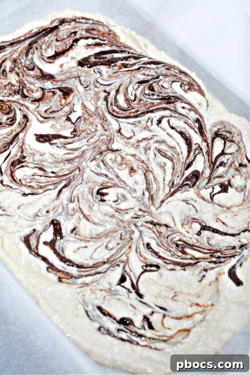 Keto Cottage Cheese Freezer Bark 13 Swirling melted chocolate into the Keto Frozen Cottage Cheese Bark base