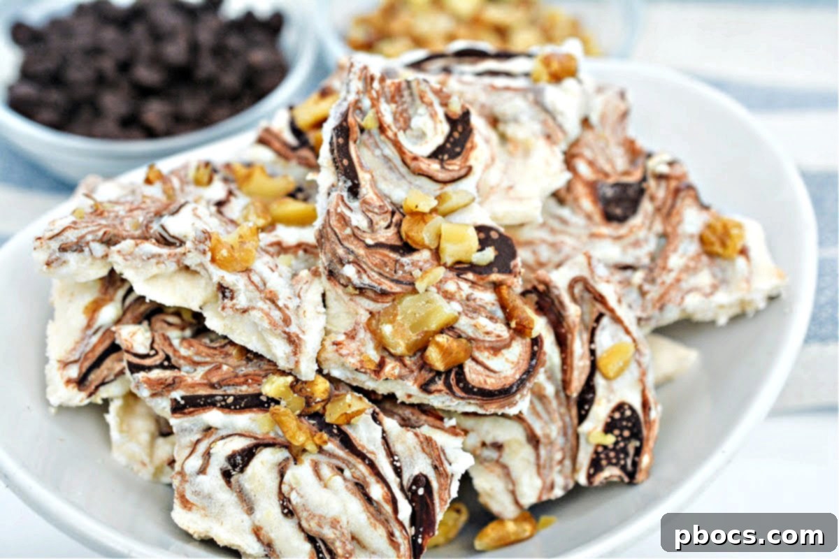 Keto Cottage Cheese Freezer Bark 6 A serving of Keto Frozen Cottage Cheese Bark on a white plate