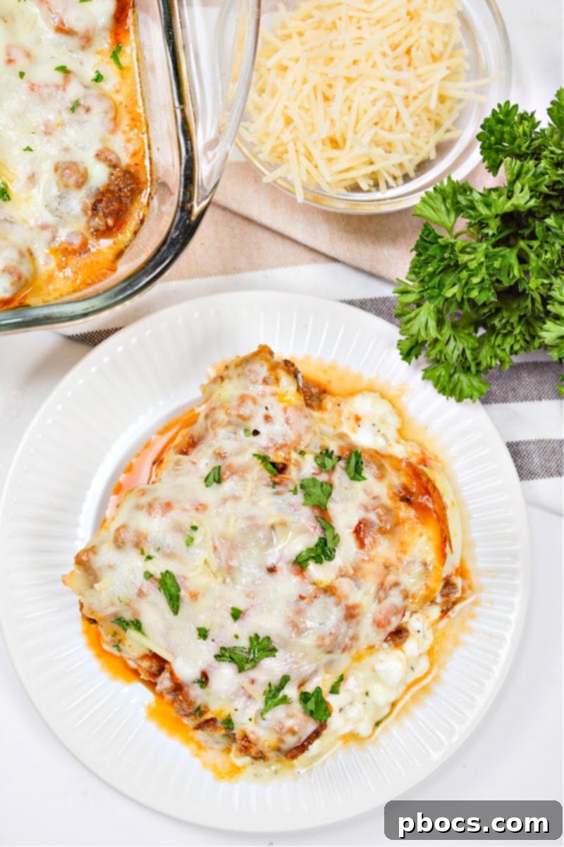 Delicious Keto Protein Lasagna with layers of meat, cheese, and marinara