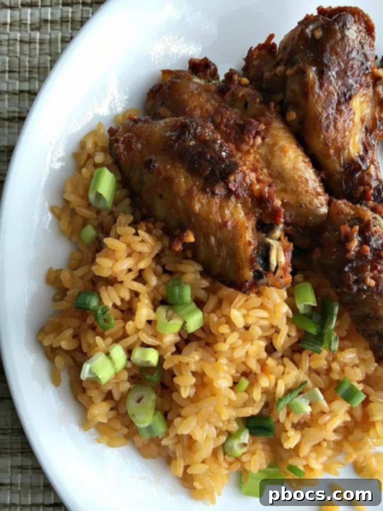 A stunning close-up of honey garlic pepper wings piled high on a serving tray, ready for a party.