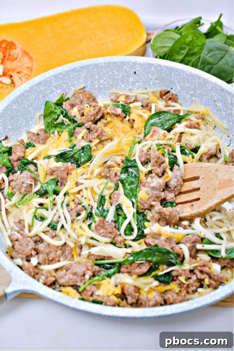 The finished Low-Carb Butternut Squash Palmini Noodles With Sausage dish, hot and ready to serve.