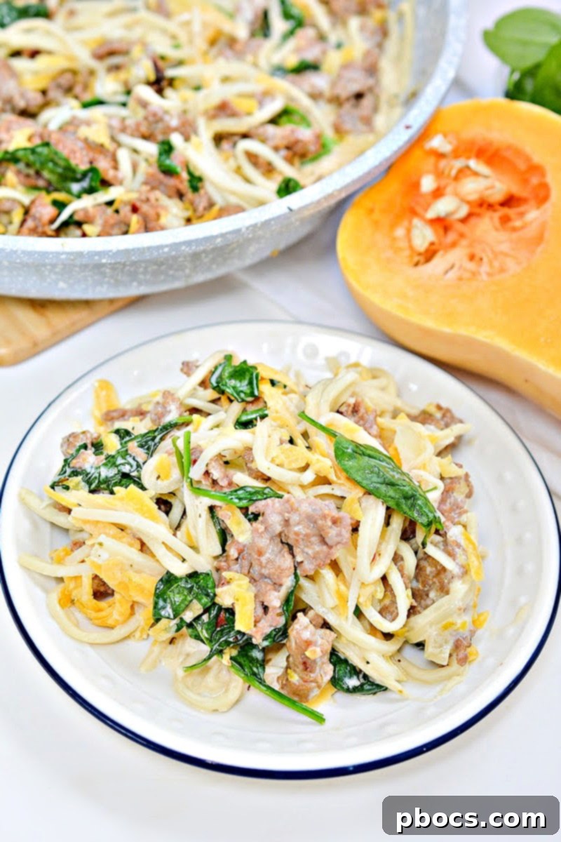 Raw Italian ground sausage, ready for cooking with butternut squash and Palmini noodles.