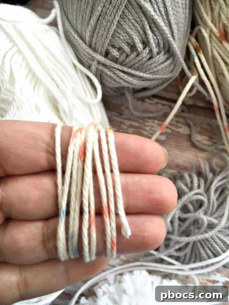 Crafting Adorable Pompom Keychains 12 DIY Pompom Keychain - Wrapping yarn around fingers