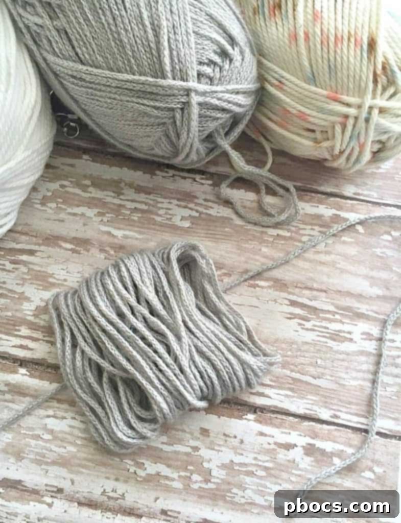 Crafting Adorable Pompom Keychains 8 DIY Pompom Keychain - Cutting yarn loops