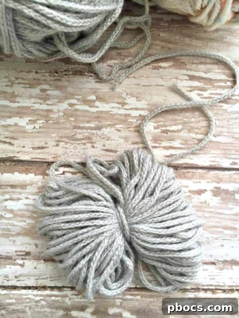 Crafting Adorable Pompom Keychains 9 DIY Pompom Keychain - Trimming and shaping