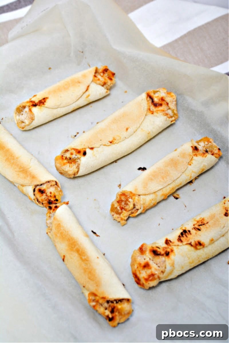 Low-Carb Peach Cream Cheese Roll Ups on baking sheet