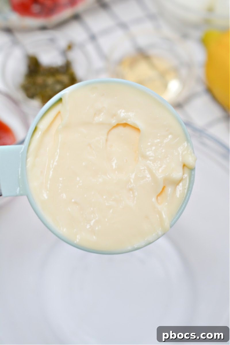 Mayonnaise, a base for the creamy dressing.