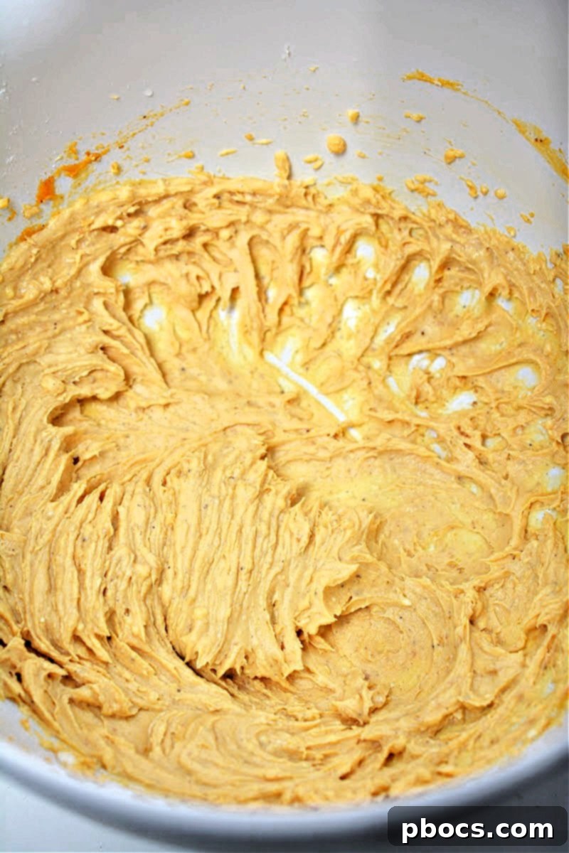 Bowl containing the smooth pumpkin cream cheese mixture