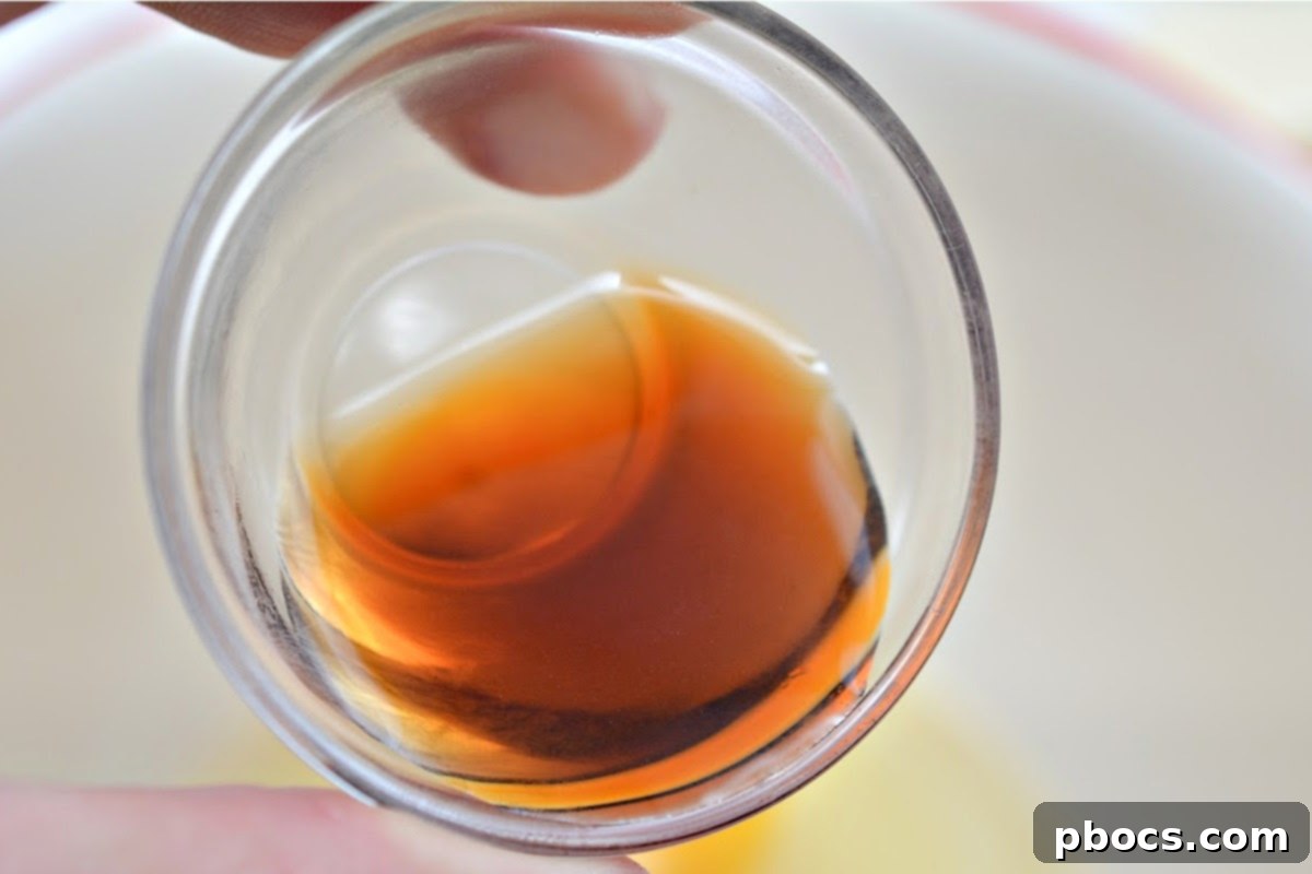 Vanilla Extract being measured for the recipe