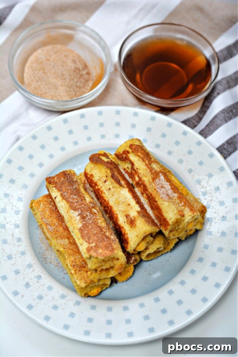 Close-up of Low-Carb Pumpkin French Toast Roll Ups, showing the golden exterior