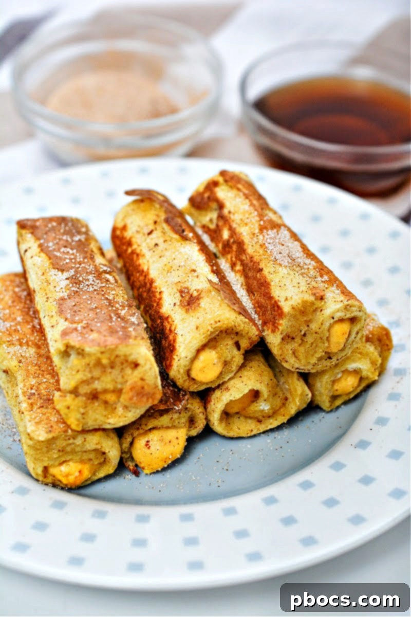 Low-Carb Pumpkin French Toast Roll Ups with a sprinkle of cinnamon