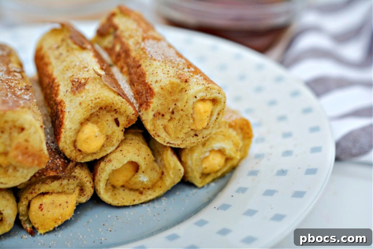 A large tray of Low-Carb Pumpkin French Toast Roll Ups, ideal for entertaining