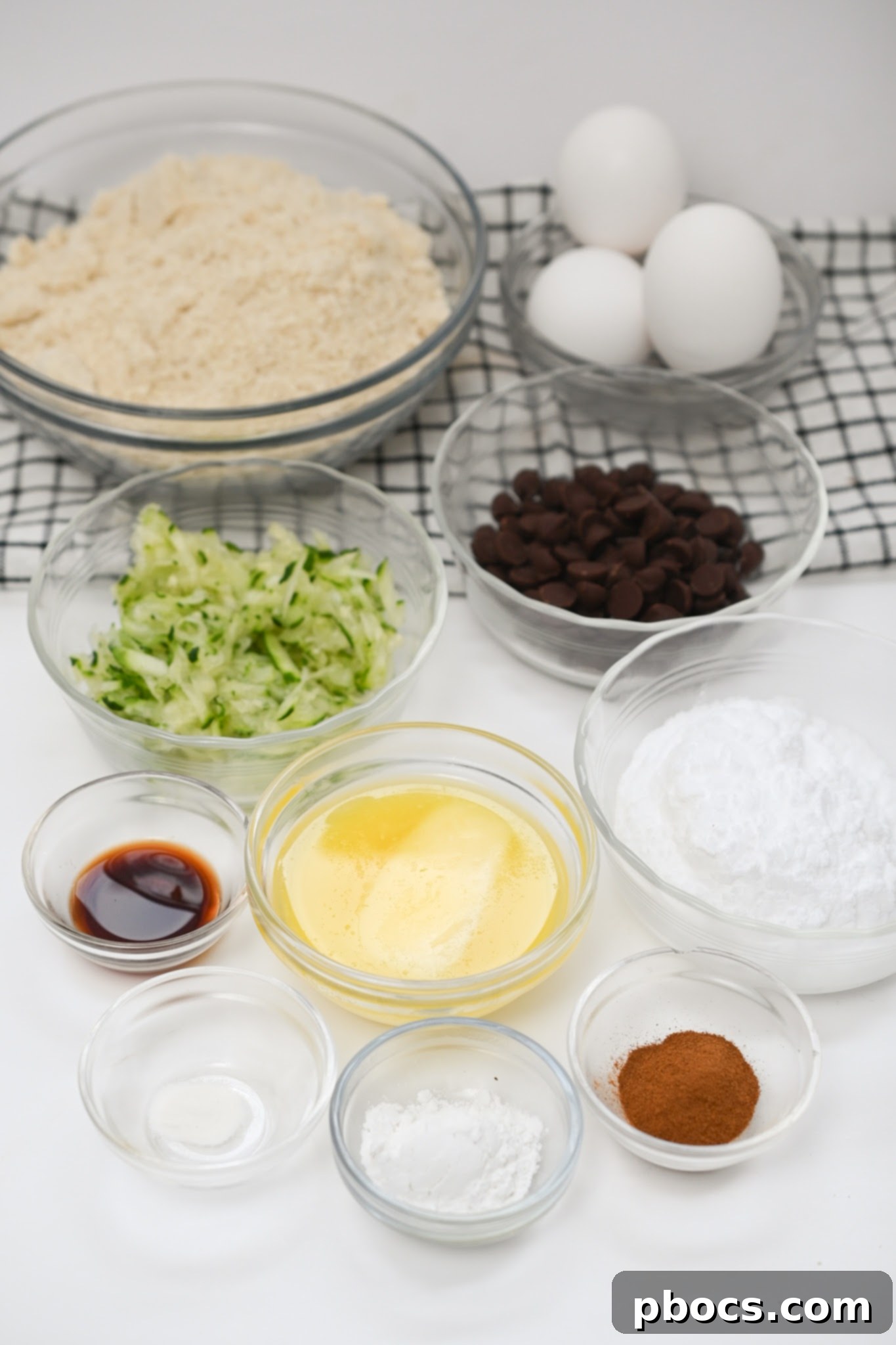 Irresistible Keto Chocolate Chip Zucchini Muffins 8 Keto Chocolate Chip Zucchini Muffins Ingredients laid out