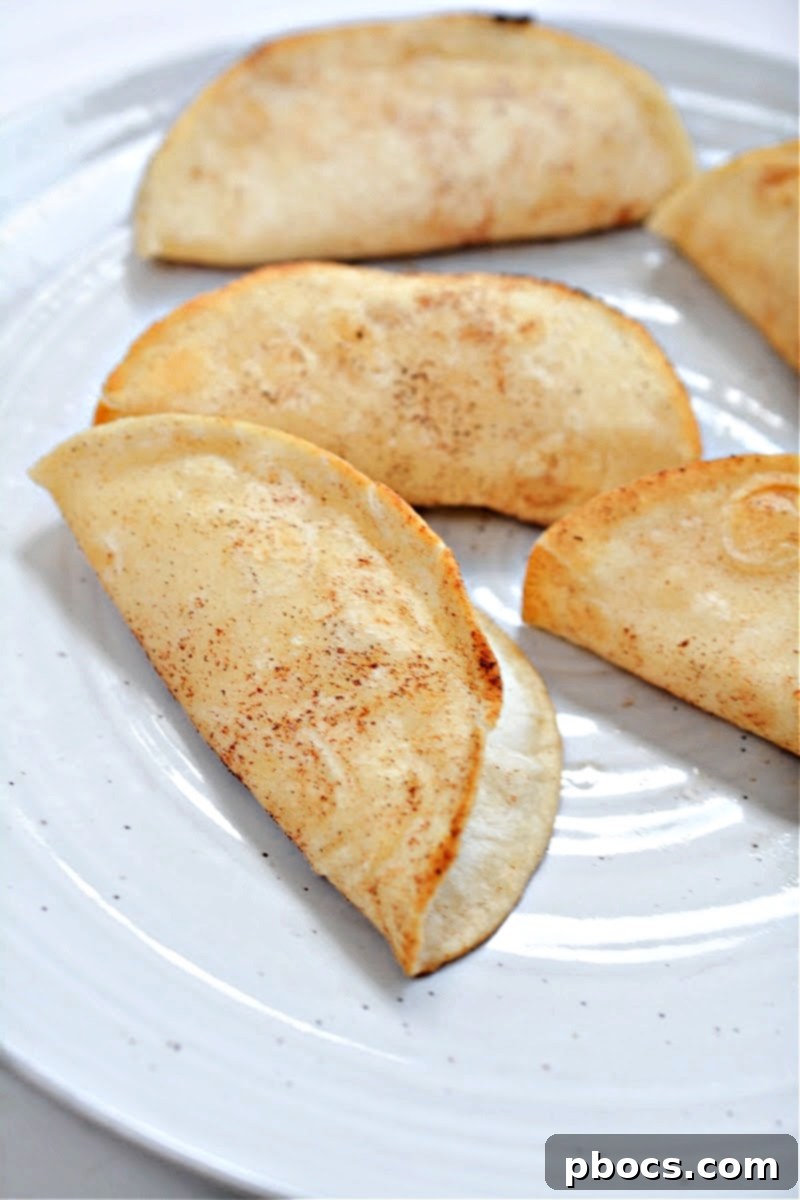 Close-up of crispy, fried keto taco shells, ready to be filled.