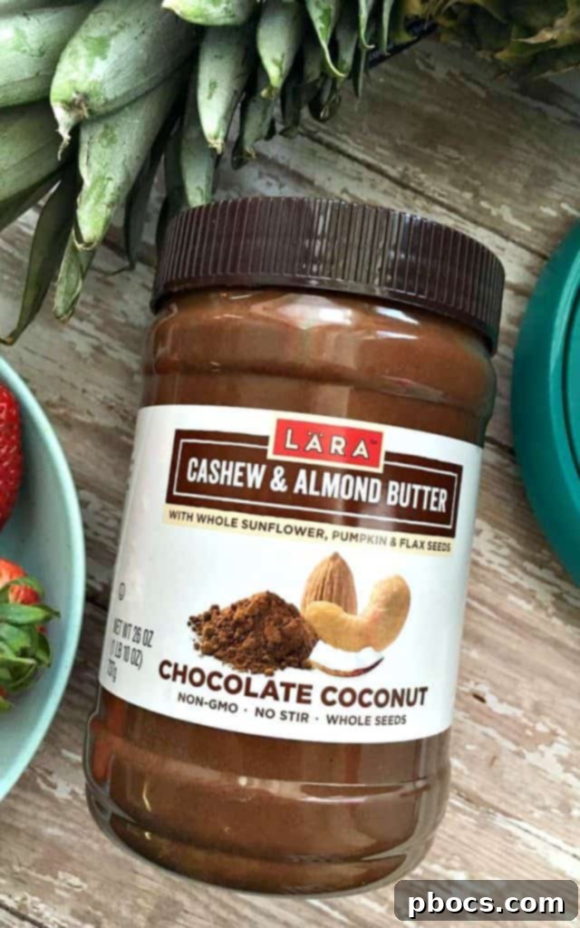 Close-up of Chocolate Coconut & Pineapple Toast, highlighting the rich texture of LÄRA Nut Butter and fresh pineapple