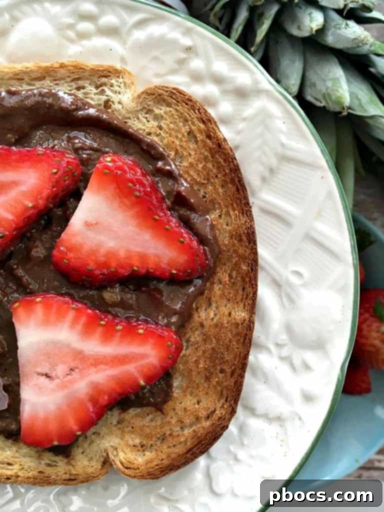 Delicious Chocolate Coconut & Pineapple Toast served on a plate, featuring LÄRA Nut Butter and fresh pineapple