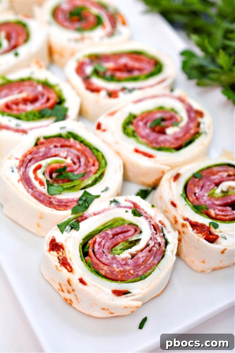 Keto Italian Swirls 2 Delicious Keto Italian Pinwheels served on a plate, ready to eat.