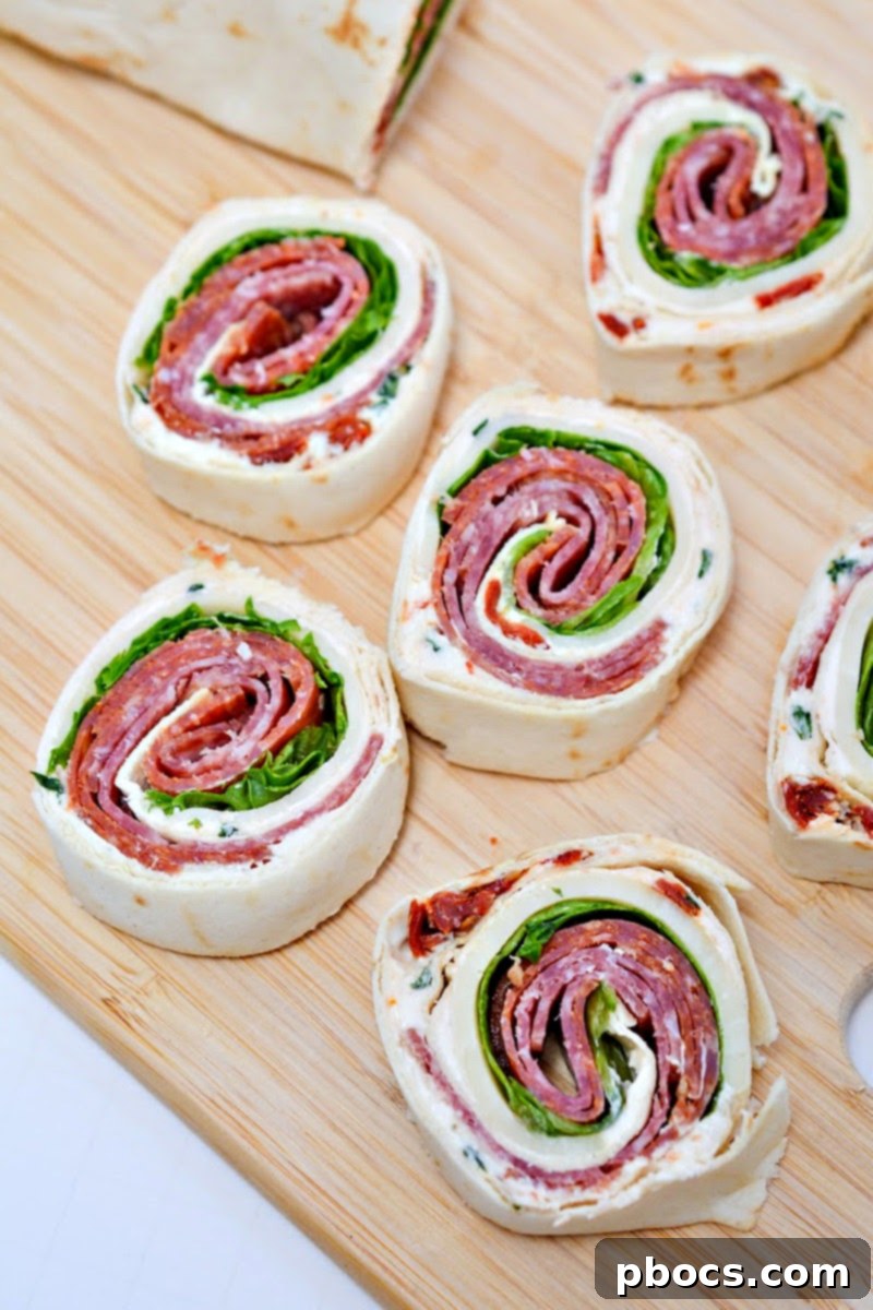 Keto Italian Swirls 15 A plate of perfectly sliced Keto Italian Pinwheels, ready to be served.