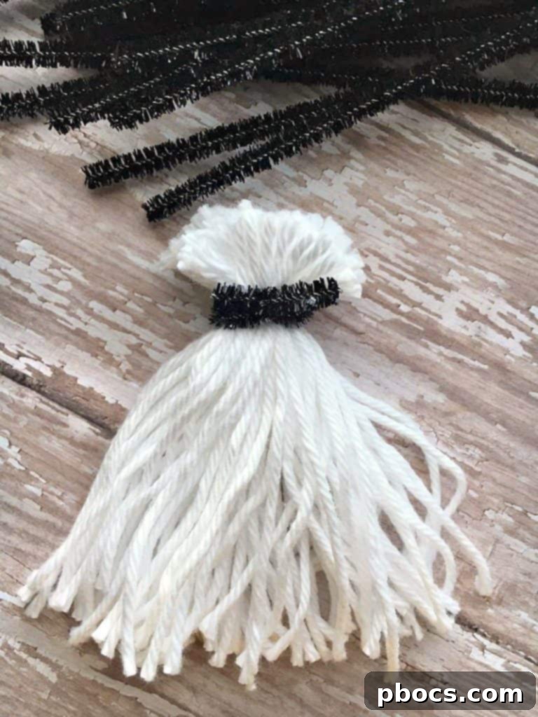 Cutting yarn loops and shaping the ghost's head and body