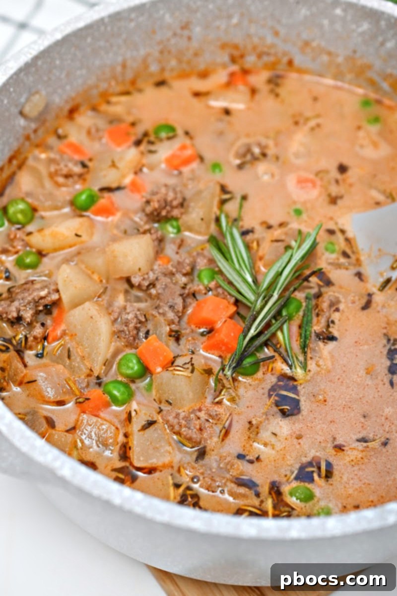Hearty Low-Carb Shepherd's Pie Soup in a rustic bowl